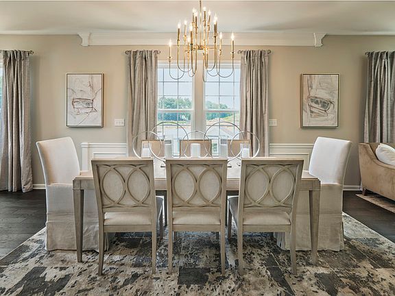 Elegant dining area surrounded by large windows