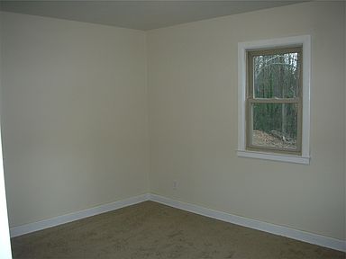 Bedroom with new carpet
