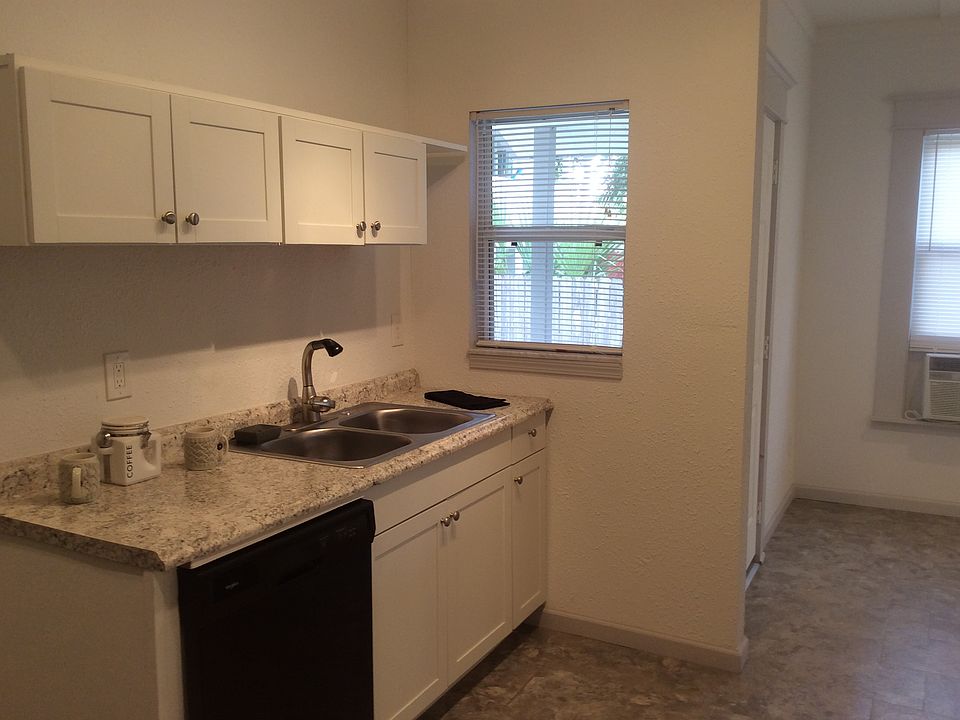 Kitchen, side yard with back door off dinette area off kitchen