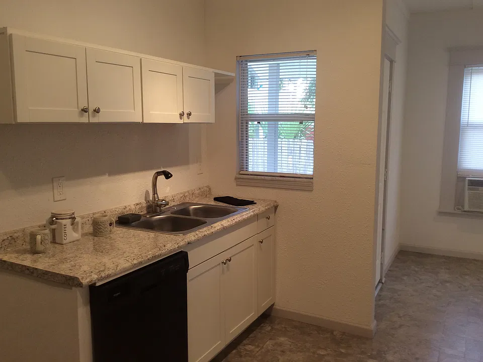 Kitchen, side yard with back door off dinette area off kitchen