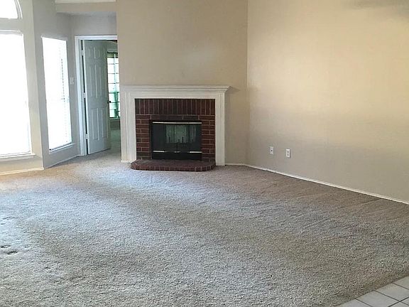 Living room with double sided fire place