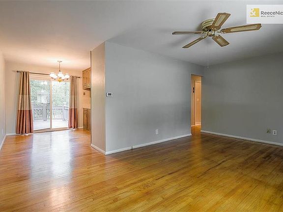 Living room opens to dining area.