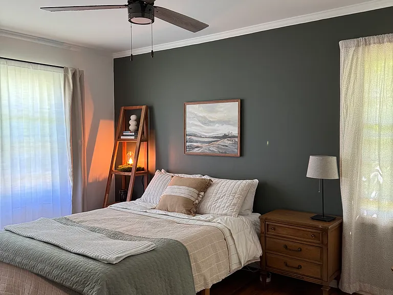 Second bedroom - cozy corner room with tons of natural daylight. Standard closet.