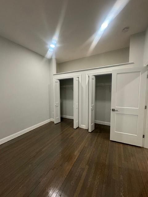 bedroom with double closets