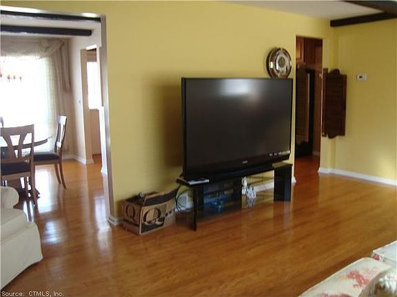 Sunlight floods every room! Great floor plan and flow with openings to both Kitchen and Dining Room