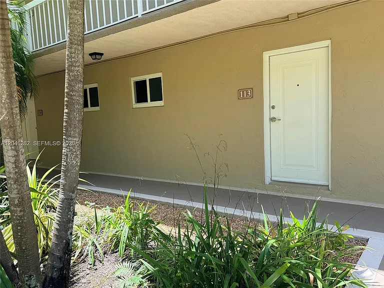 7730 Camino Real #F-113 — Photo 2