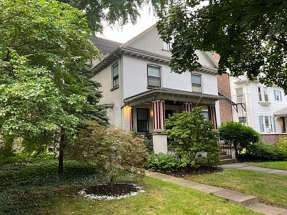 Front with private porch and entry