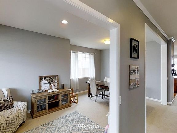 View from entryway.
*Updated with hard surface flooring throughout
*Updated with cellular blinds