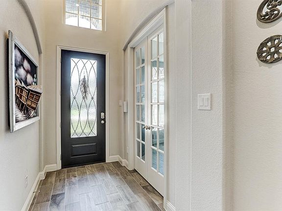 Foyer with doors to the home office