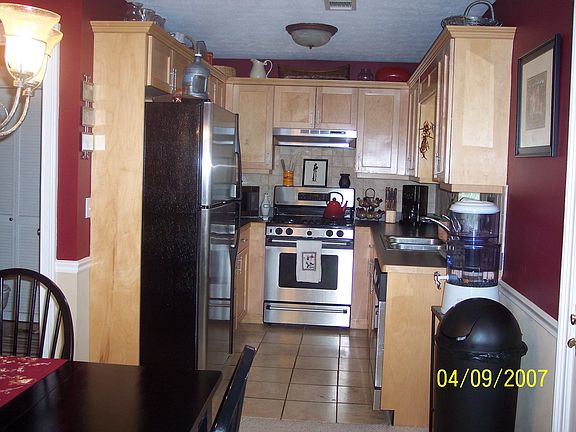 Kitchen are with custom maple cabinets