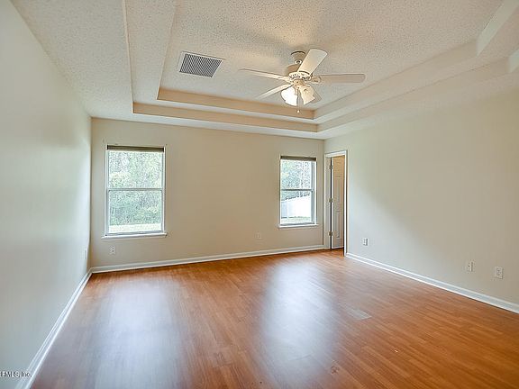 5th image of 7032 Rapid River Dr W