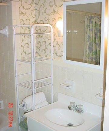 Full bath; tub & shower, left.