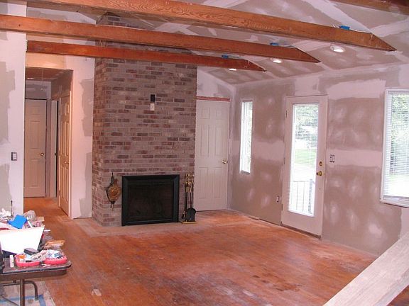 Great room with new fireplace & cathedral ceiling
