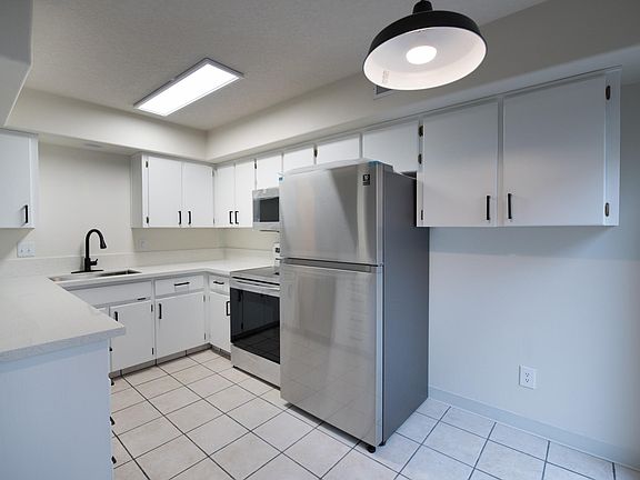 All kitchen appliances, sink, faucets and top quality quartz countertop are brand new.