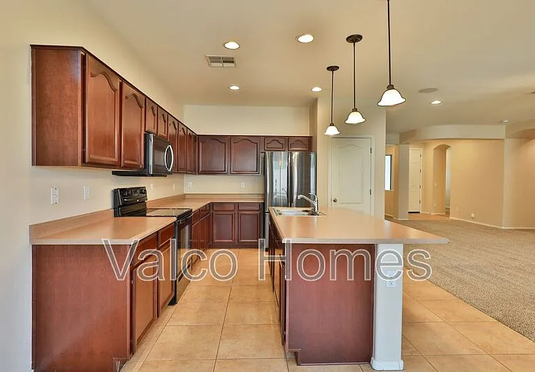 11412 E Segura Ave — Photo 1