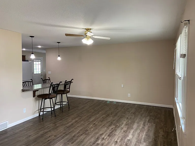 Living room view from doorway across length of room