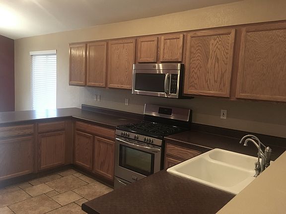 Large kitchen with stainless steel appliances