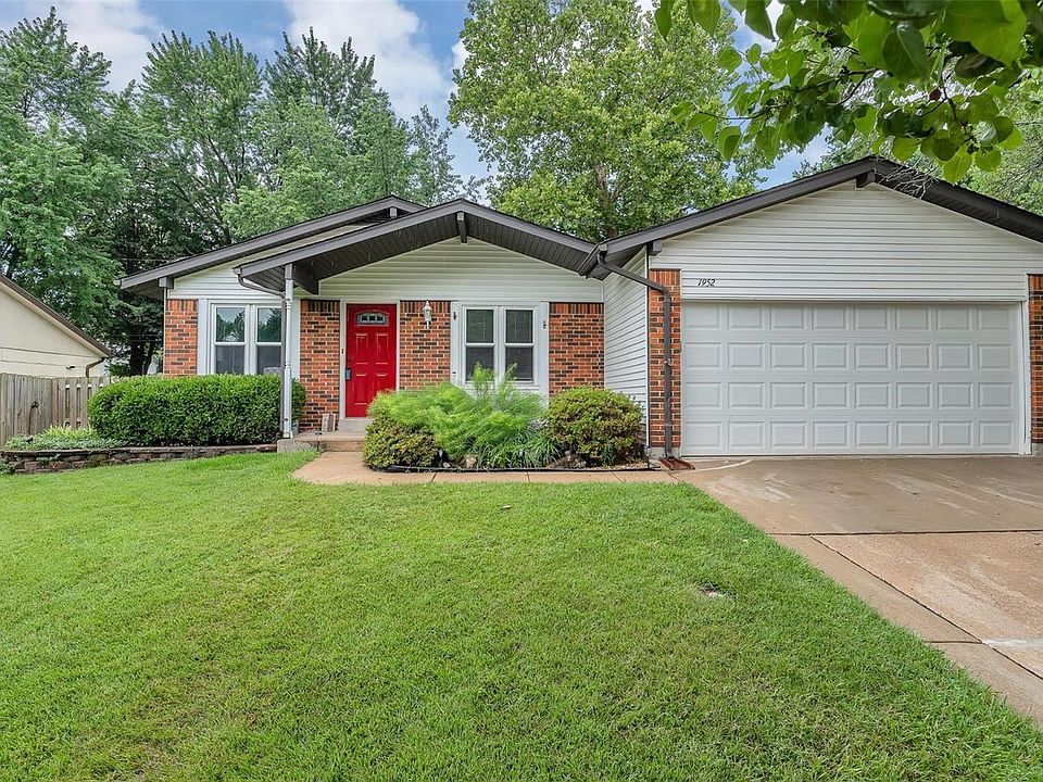 Laminate flooring, new carpeting, spacious kitchen, formal dining & finished lower level!