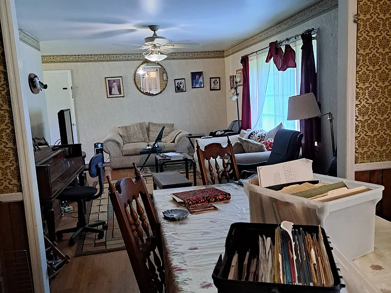 Dining room table looking into living room