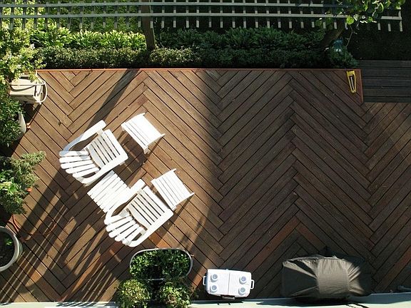 Backyard deck (Yard also contains fire pit)