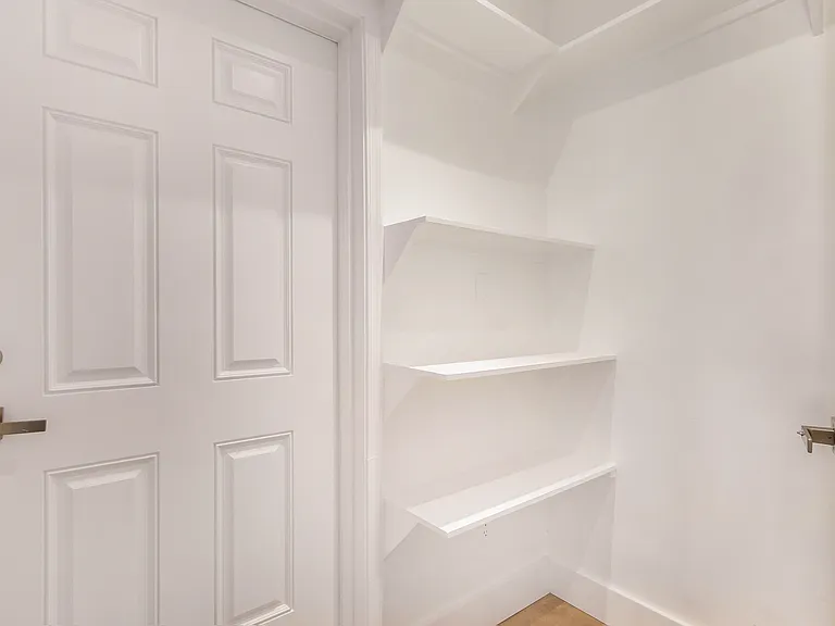 Closet and door to garage