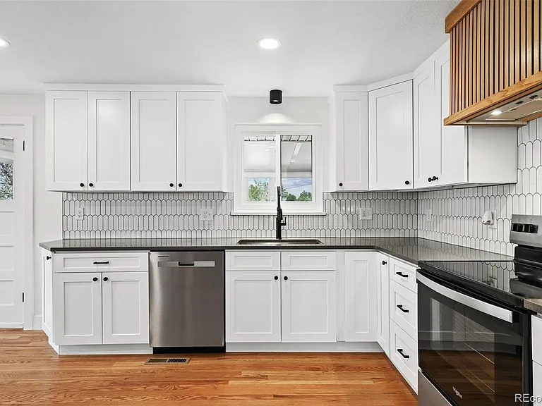 6745 Garrison St — Photo 13