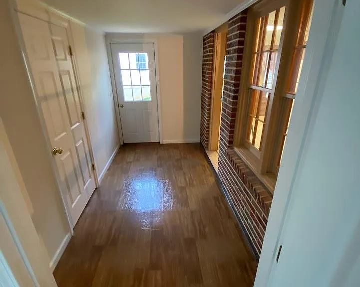 Hallway leading to the back door patio