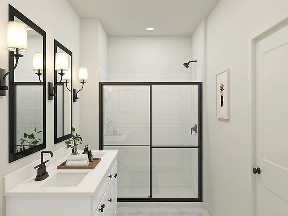 Primary bath with glass shower enclosure