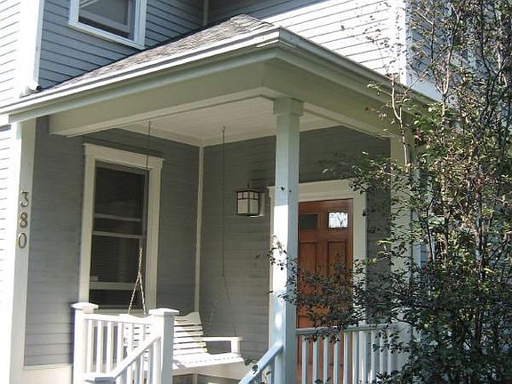 Inviting entry with porch swing