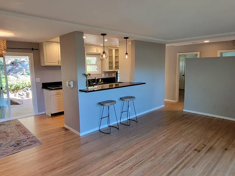 Living room- sliding glass door to garage and backyard