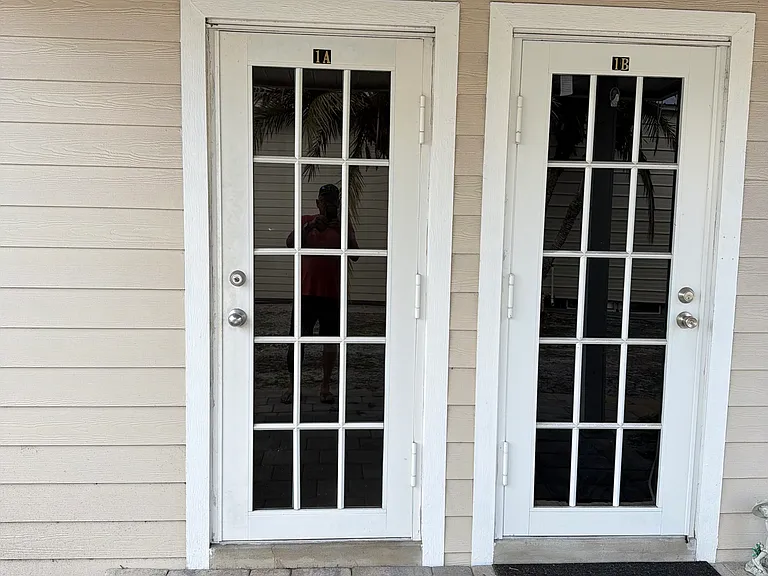 Front Entrance - Impact Glass Door (Left Unit)