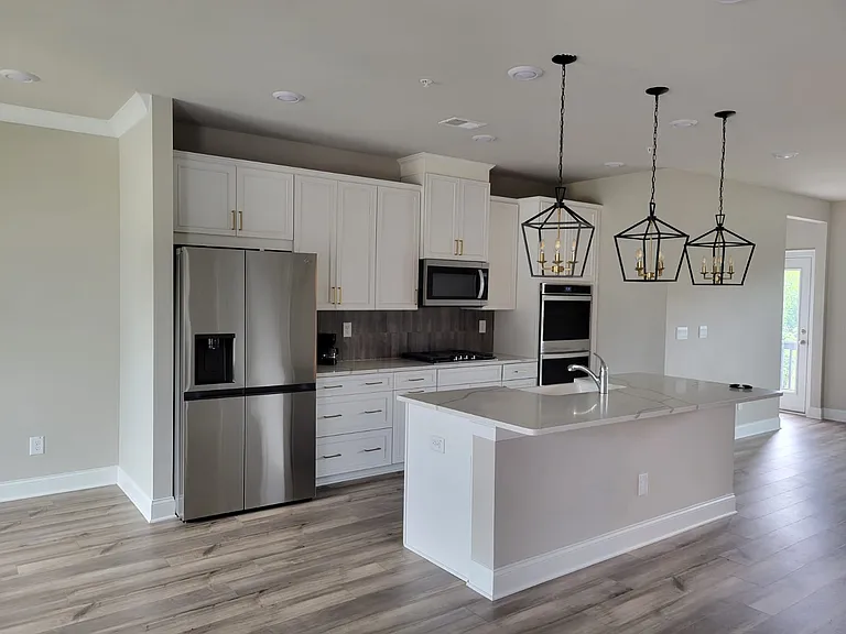 Open kitchen with Refrigerator and other, other major appliances
