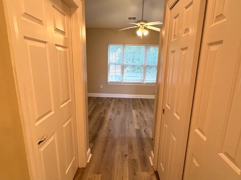 from bathroom to primary bedroom
