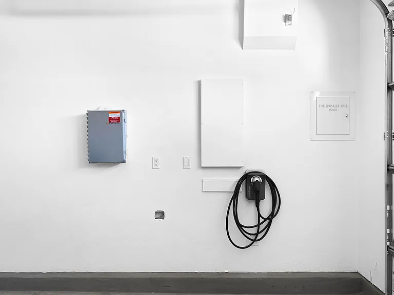 No need to make any pit-stops as our home is equipped with an EV charger!