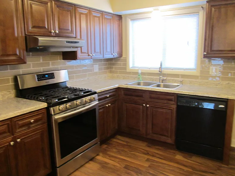 UPDATED KITCHEN CABINETS AND APPLIANCES