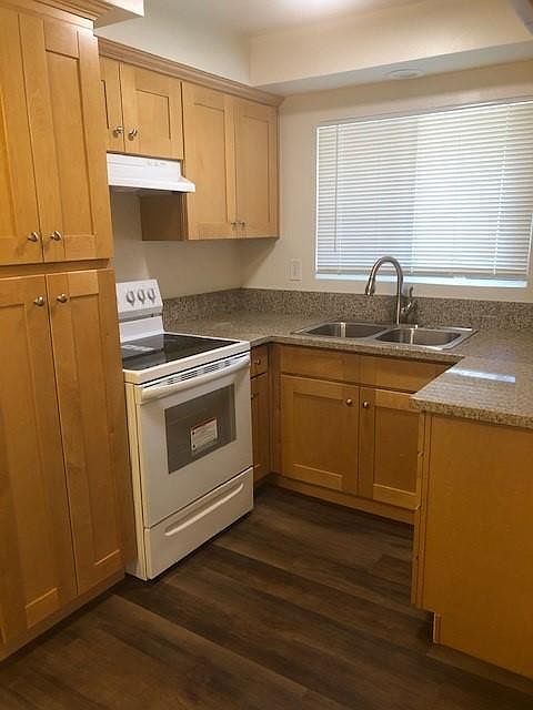 All new cabinets, sink, counters & range