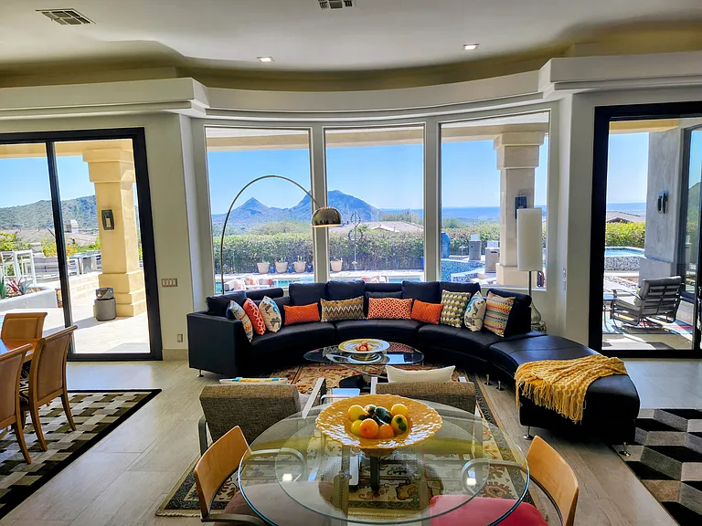 Walls of windows open onto the covered terrace