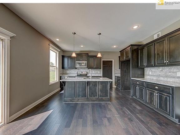 Generous cabinet and counter space with convenient USB outlet ports on the back splash.