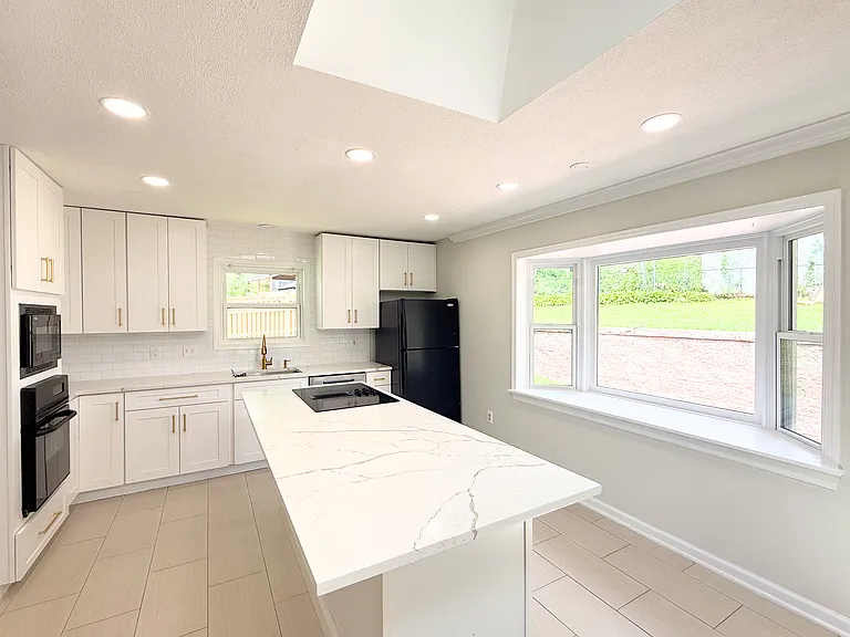 12915 Grenoble Dr — Photo 4