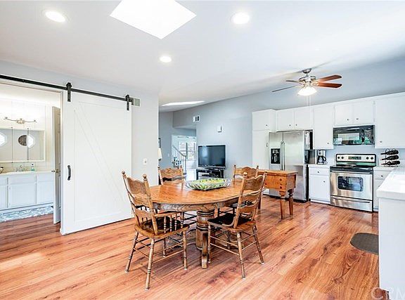 Expanded Kitchen with direct access to main level Master Suite through sliding Barn door
