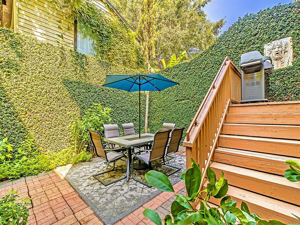 Welcome to your private oasis! Lined in jasmine, this bricked private patio is the perfect place to sit, relax and entertain.