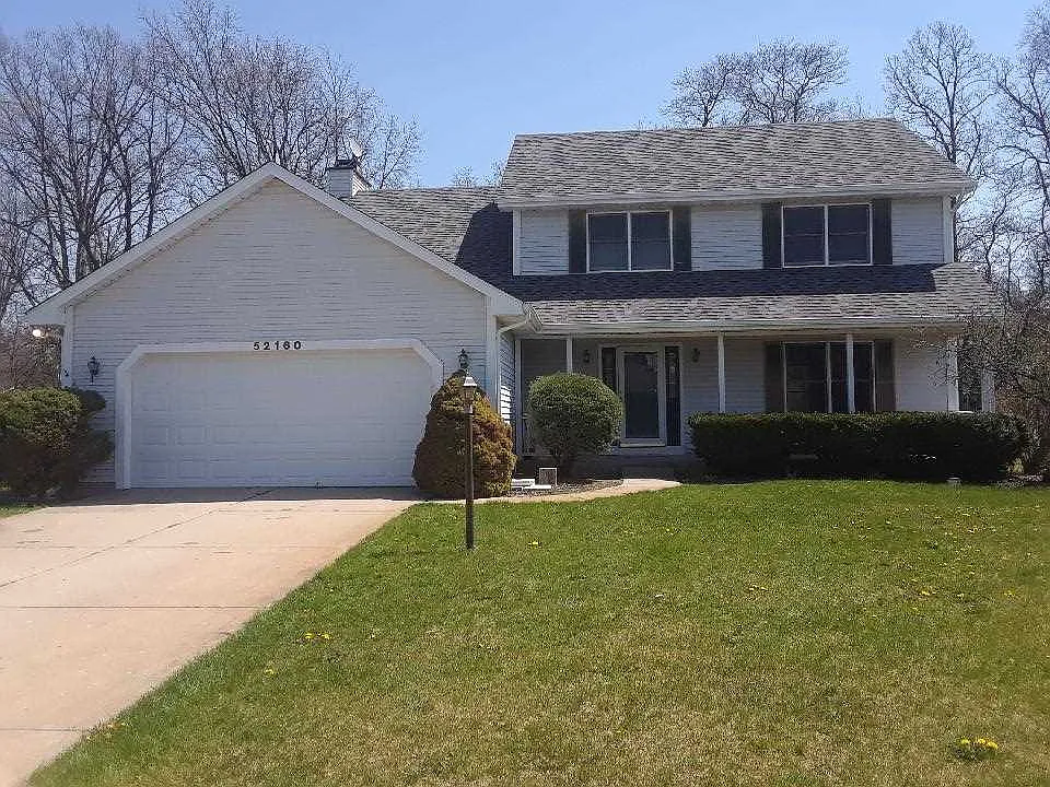 52160 Woodsedge Dr photo 1