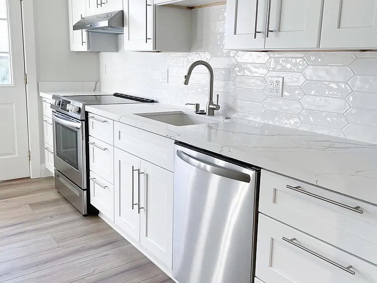 Unit 413 has refinished hardwood flooring rather than LVT like this unit 417
