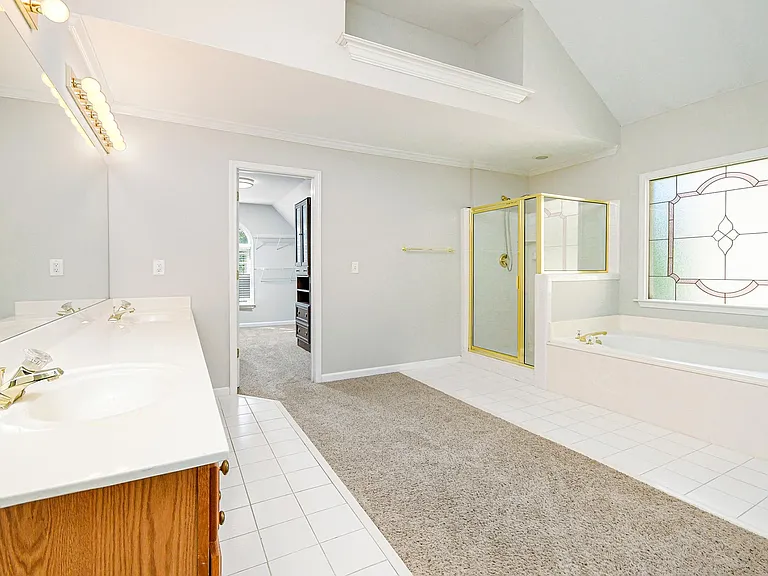 Master Bath with His and Hers Vanities.