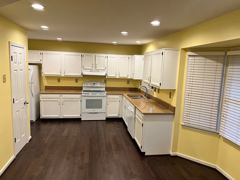 New hardwood floors. Walls have been repainted to neutral colors