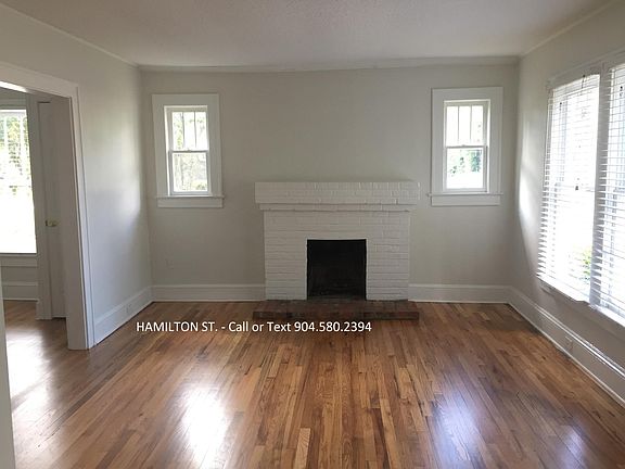 LIVING - period features (chimney not functioning); wood floors & loads of natural light