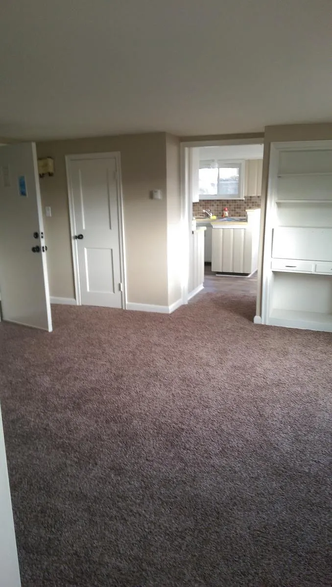 living room with new carpet and paint - 502 1st St SW #4