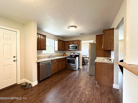 5th image of 7963 NARANJA Drive W