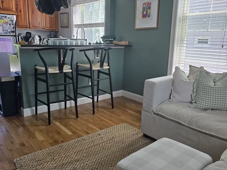 Eat in Bar and open concept between Living and Kitchen.