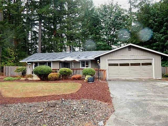 Front view of Adult Home that is nicely landscaped and well taken care of on the exterior. Located on just under .25 acres.  New roof.  Home offers 3bedrooms, 2 baths and 1455 sqft.  Home is located at the end of a cul-de-sac.